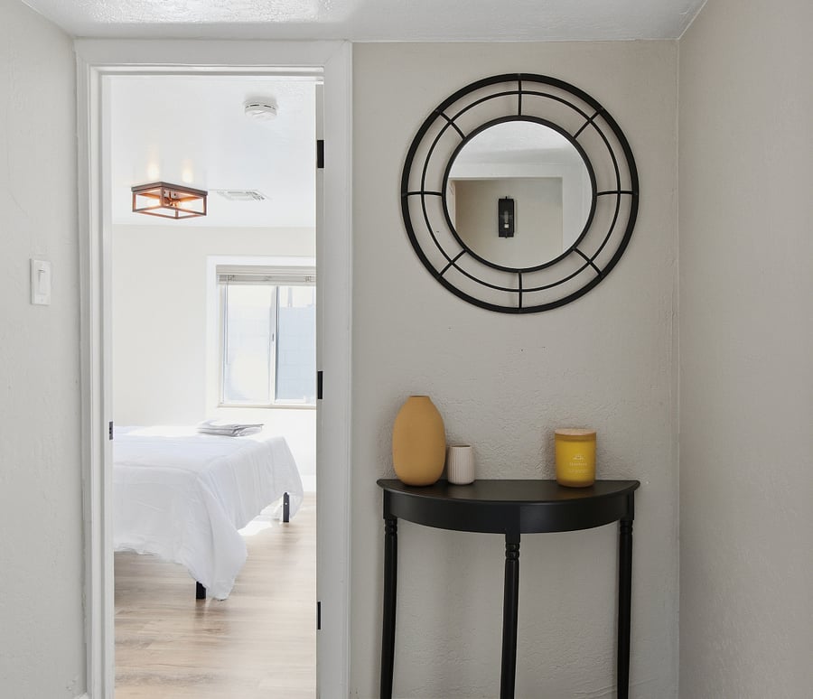 Decorative hallway between bedrooms.