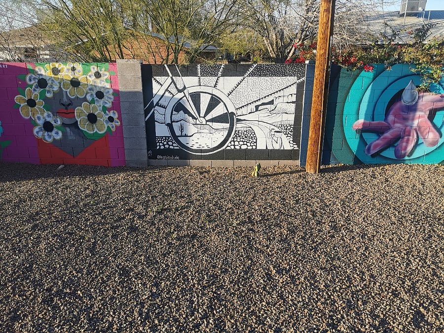 More creative murals make the canal vibrant and fun.