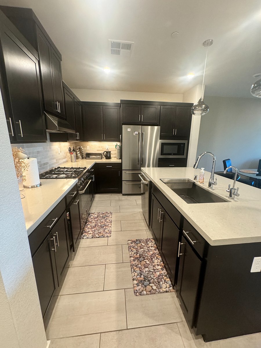 Spacious and updated kitchen is fully stocked and equipped.