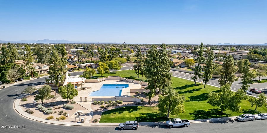 Aerial view of community pool in neighborhood