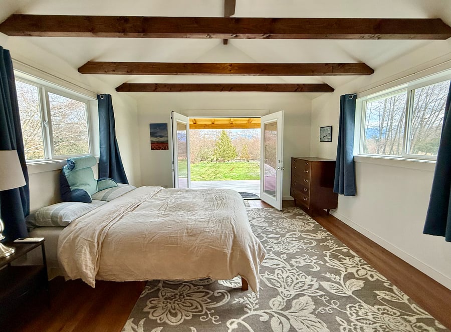 Bedroom with double doors open