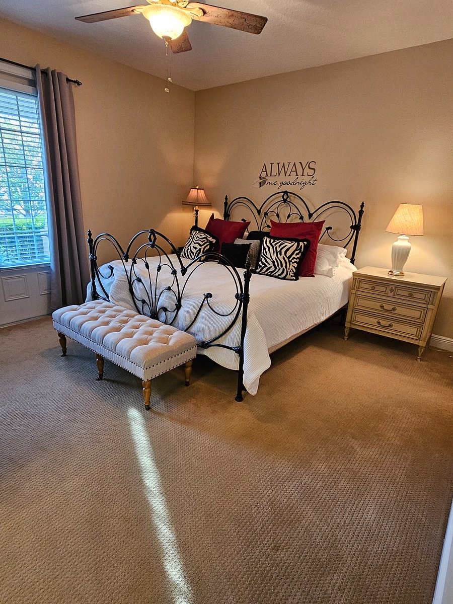 Downstairs King Master bedroom with french doors to front porch