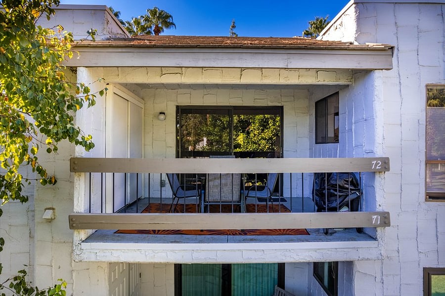 balcony with grill and washer/dryer