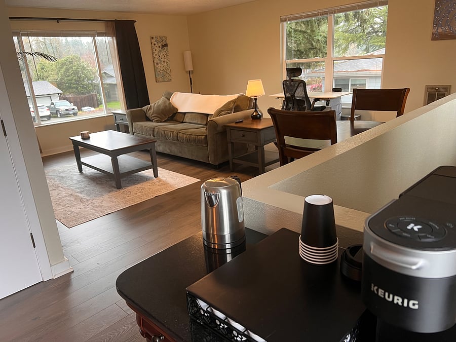 Coffee bar with living room in the background.