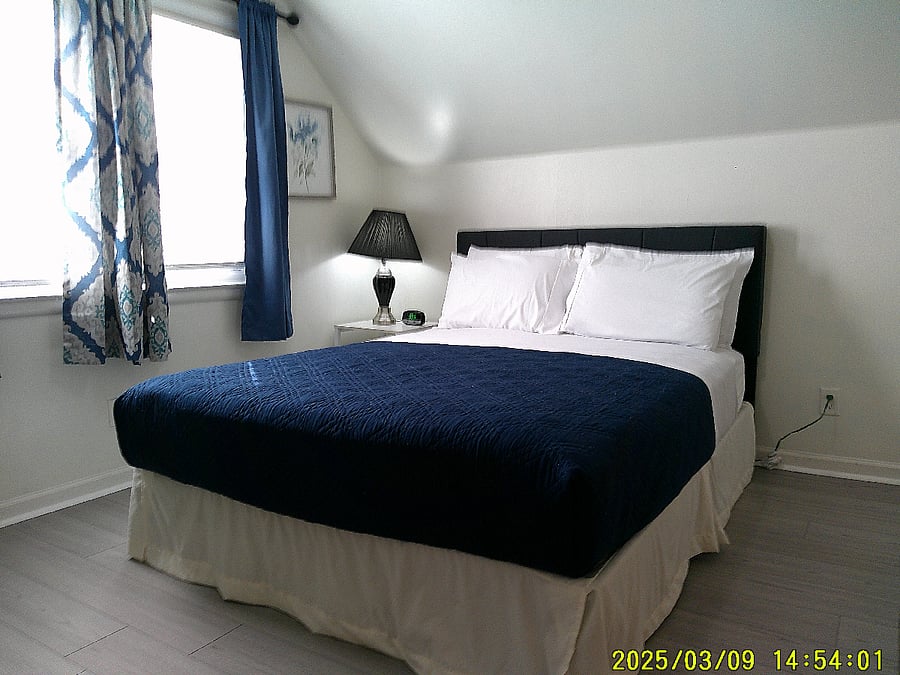 2nd Level - Bedroom 3 - Queen Size bed with TV.