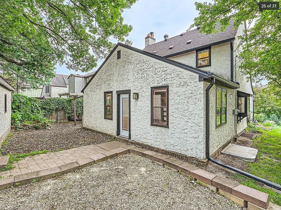 Off-street parking with a space off of the shared driveway. (Note: not pictured, the backyard is now fully fenced)