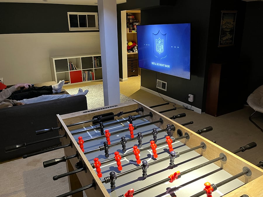 foosball, pull-out sofa for watching TV