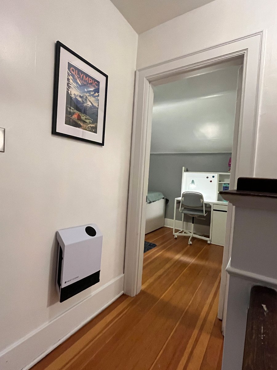 desk in bedroom with 2 twin beds