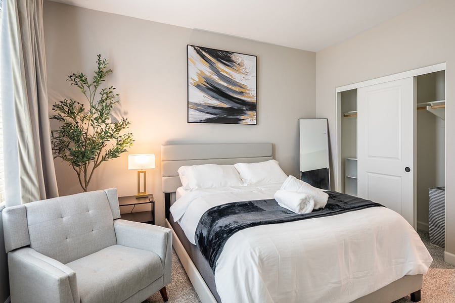 Comfortable second bedroom with full bed and ample storage