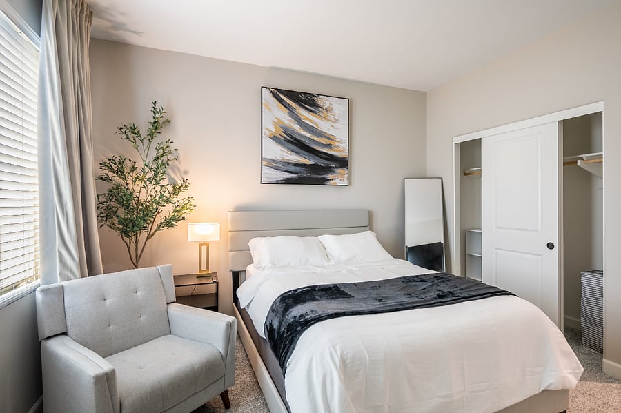Comfortable second bedroom with full bed and ample storage