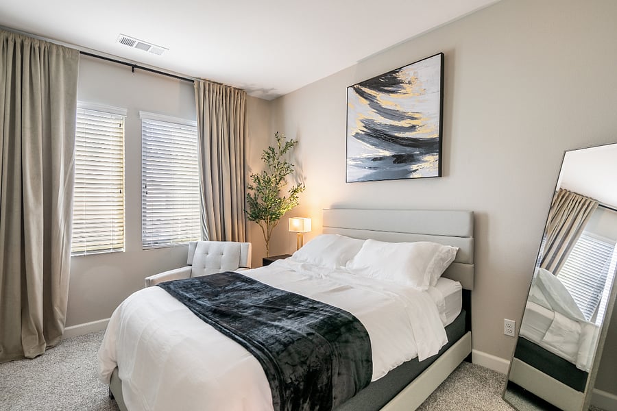 Comfortable second bedroom with full bed and ample storage