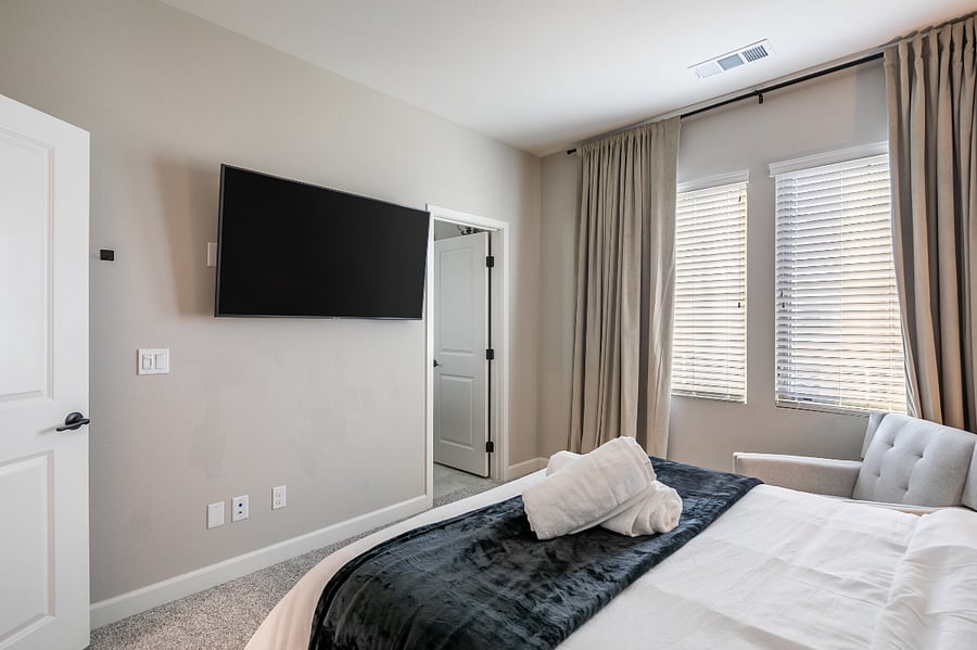 Comfortable second bedroom with full bed and ample storage