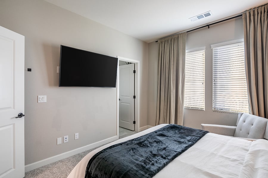 Comfortable second bedroom with full bed and ample storage
