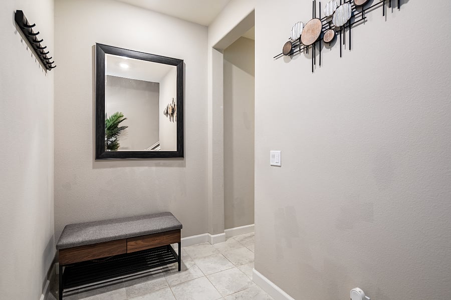 Bottom floor bench to relax or put on shoes.