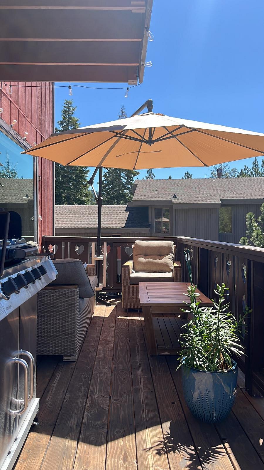 the main balcony with bbq, chairs and sun protection