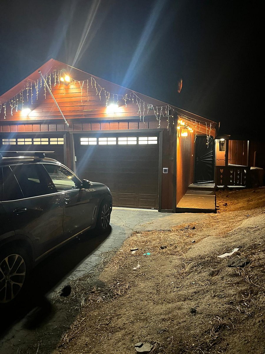 entrance at night with flood lights and walkway