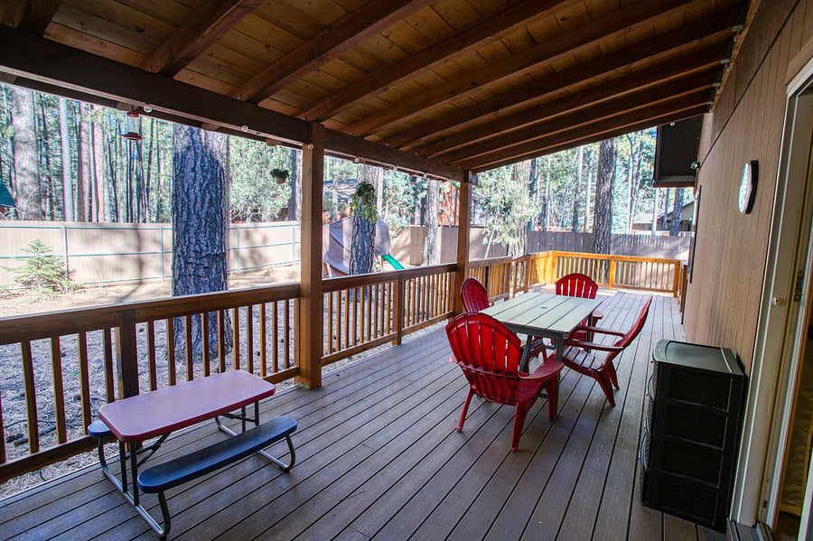 Great area to relax and watch kids play on the swing set.