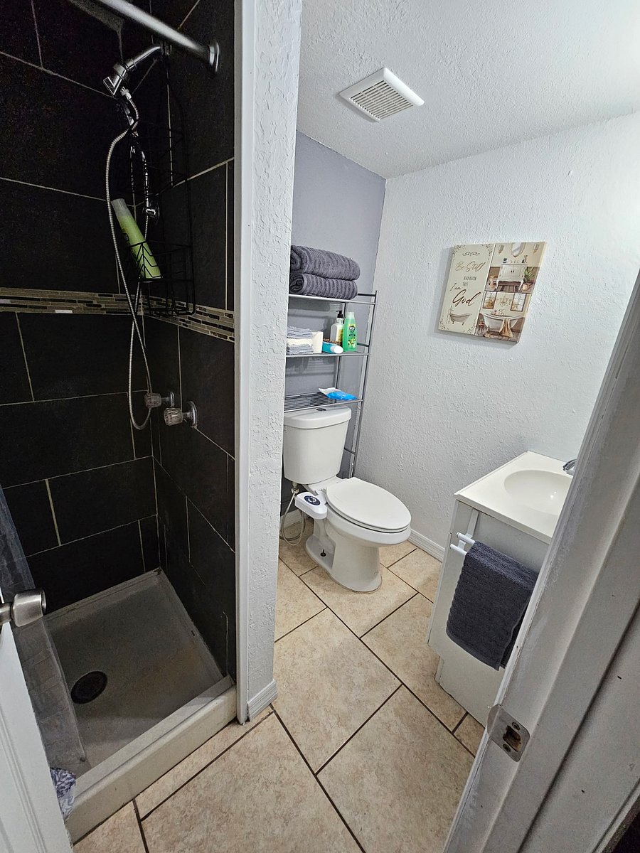 small bathroom 7ft x 5ft = 35 sq.ft. Small standup shower 2.5ft x 2.5ft = 6.25 sq.ft.
