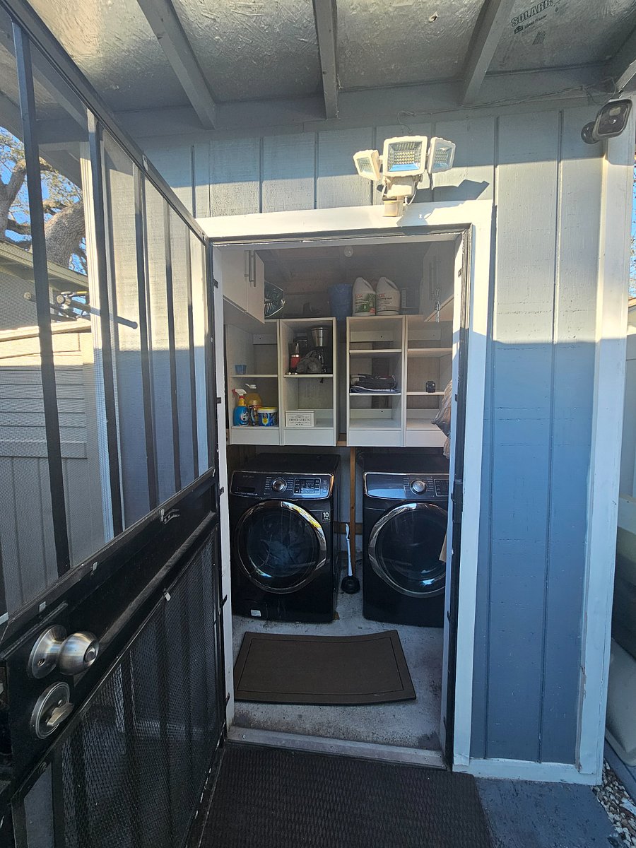 Exterior Washer and Dryer just a few steps to the right of your front door. yield to the right approximately 15 feet the laundry room will be across from room#2 on your left. (Detergent is not included).