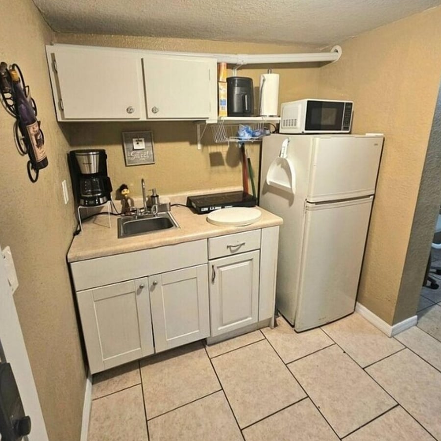 Kitchenette 8ft x 7ft=56 Sq. Ft. Comes with microwave, refrigerator, stovetop, coffee machine, air fryer, utensils, and much more.