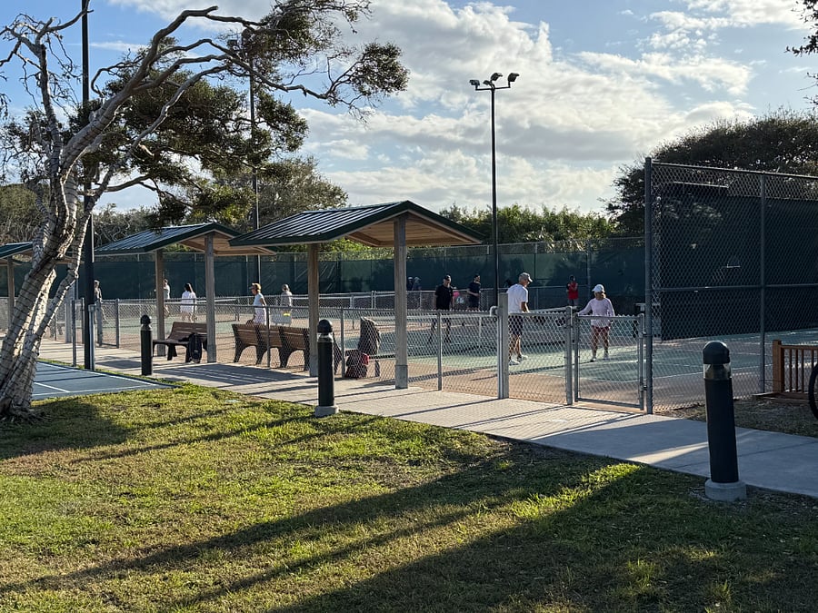 Community new pickle ball courts next to community.