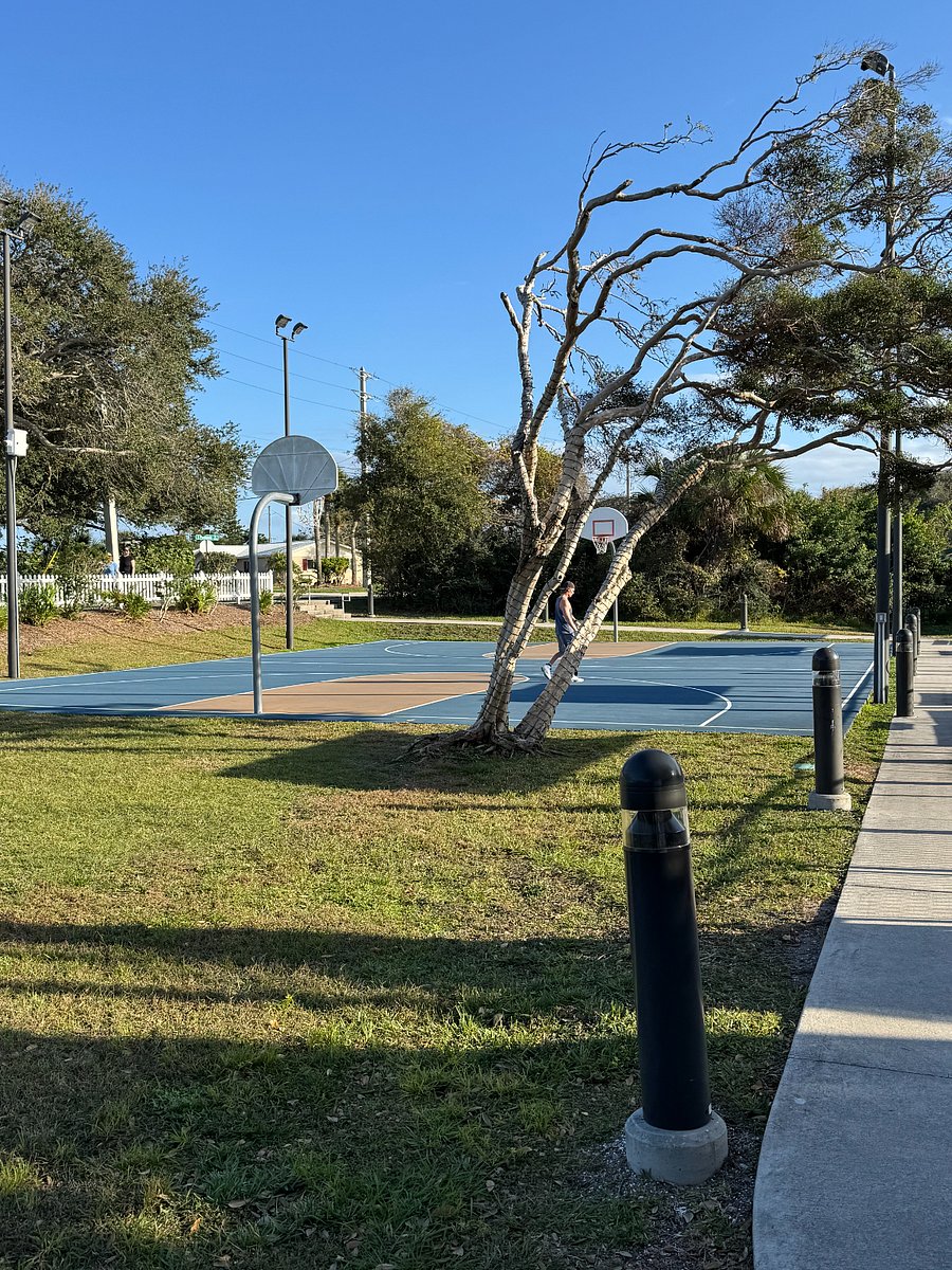 Community basketball courts next to community.