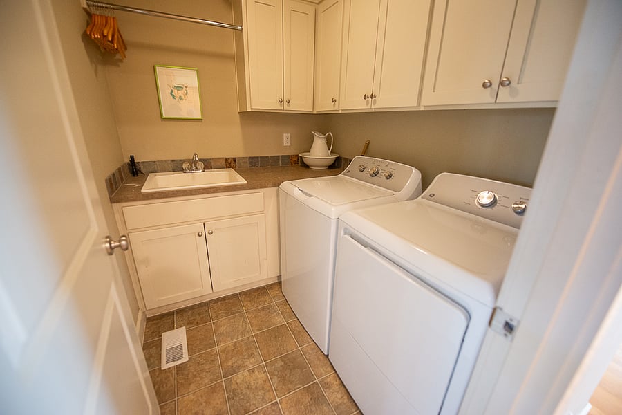 Laundry room off kitchen.