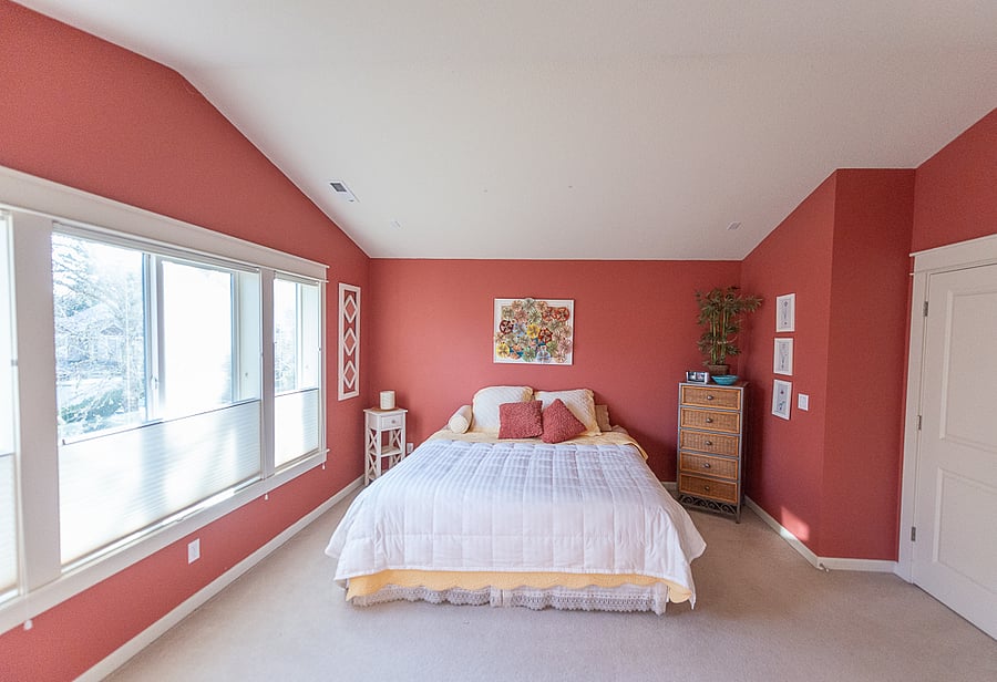 Upstairs master bedroom with double doors and a great forested and across the valley view.