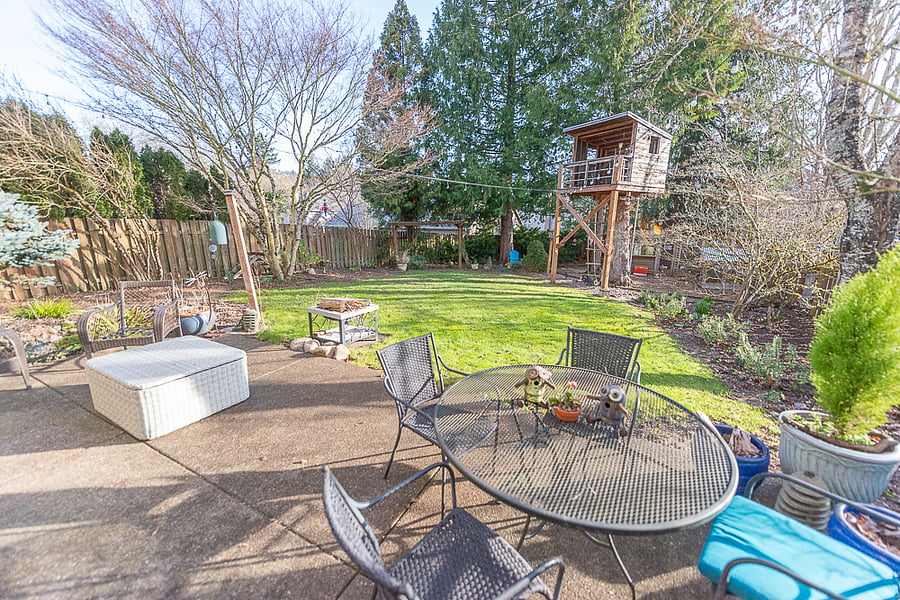 Large patio with dining and lounging seating, as well as a nice BBQ.