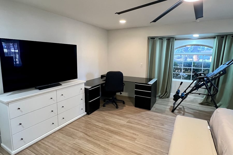Master Bedroom with 65" TV and Desk