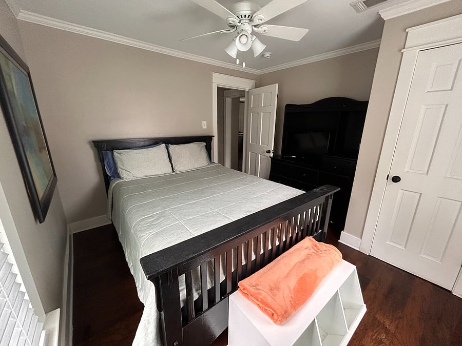 Bedroom 2 - Queen Bed - Black Dresser w/ Smart TV on top