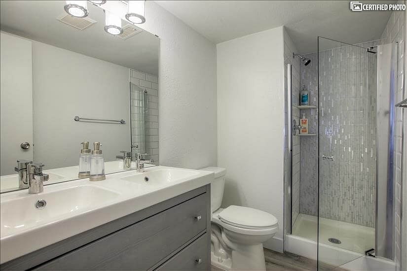 Main bedroom has its own bathroom with shower, toilet and 2 sinks