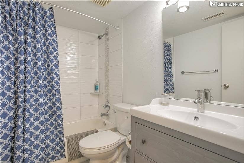 Full bathroom in the hallway for guests and so each bedroom has their own bath