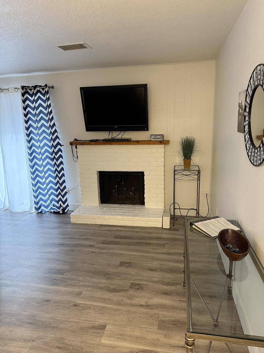 Indoor wood burning fireplace was brightened up in Dec 2025.
