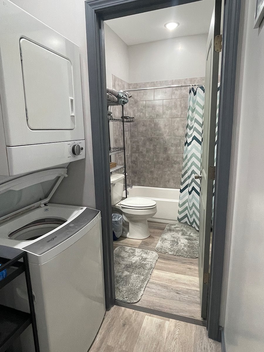 Tiled bath with attached laundry