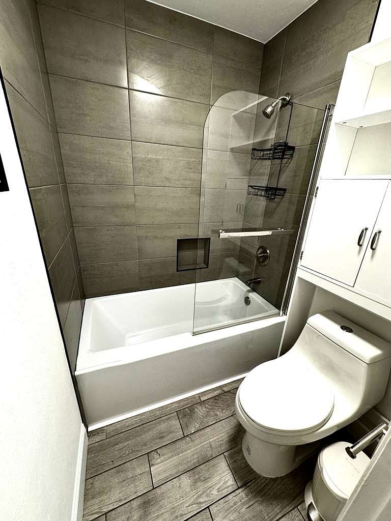 Shower and tub, first bathroom