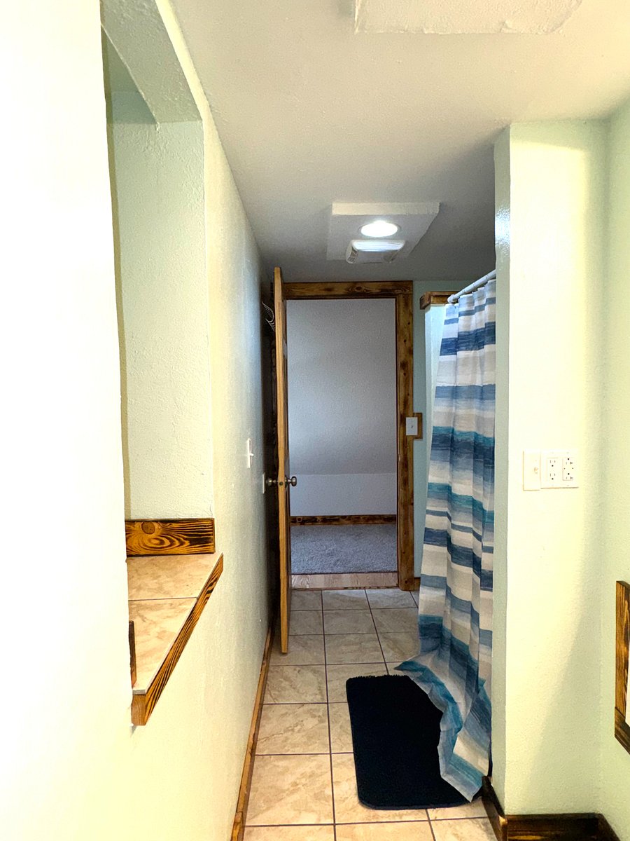 Bathroom look towards the entry area.