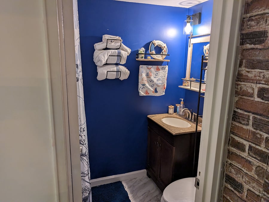 Sparkling clean, newly updated bathroom with fresh towels and all the essentials.