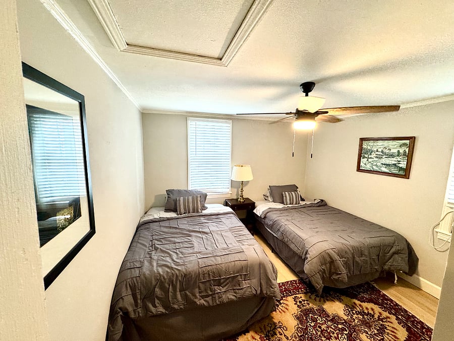 2 Twin Beds with Ceiling Fan