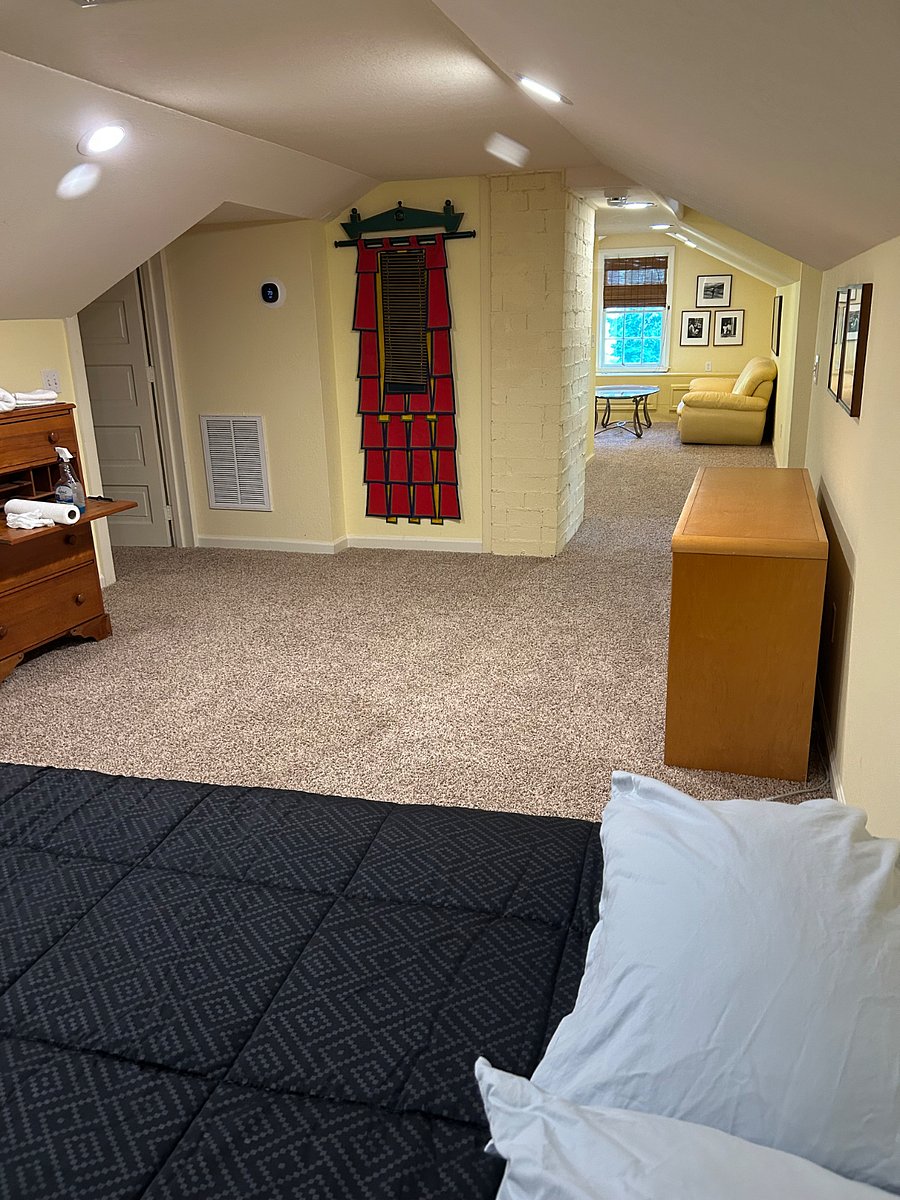Bedroom with view into living room