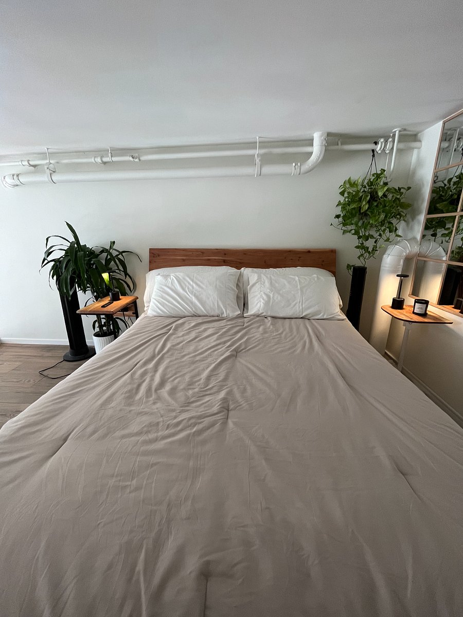 Queen size bed with two sets of bedding