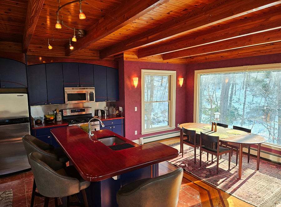 Kitchen with island, dining room
