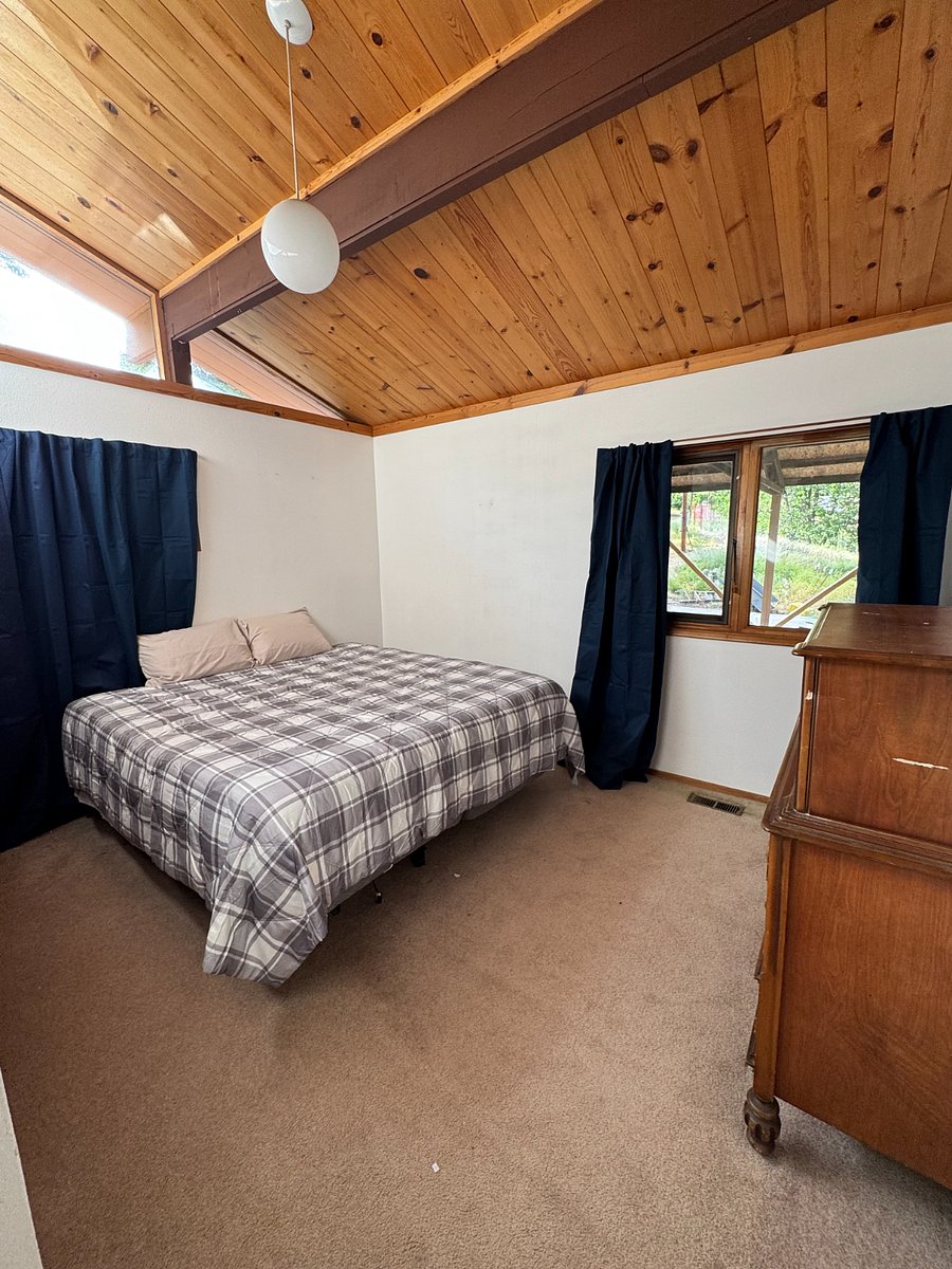 Upstairs bedroom 1 with king bed, dresser and large closet