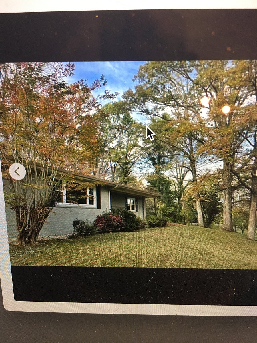 Looking from front yard at front of house