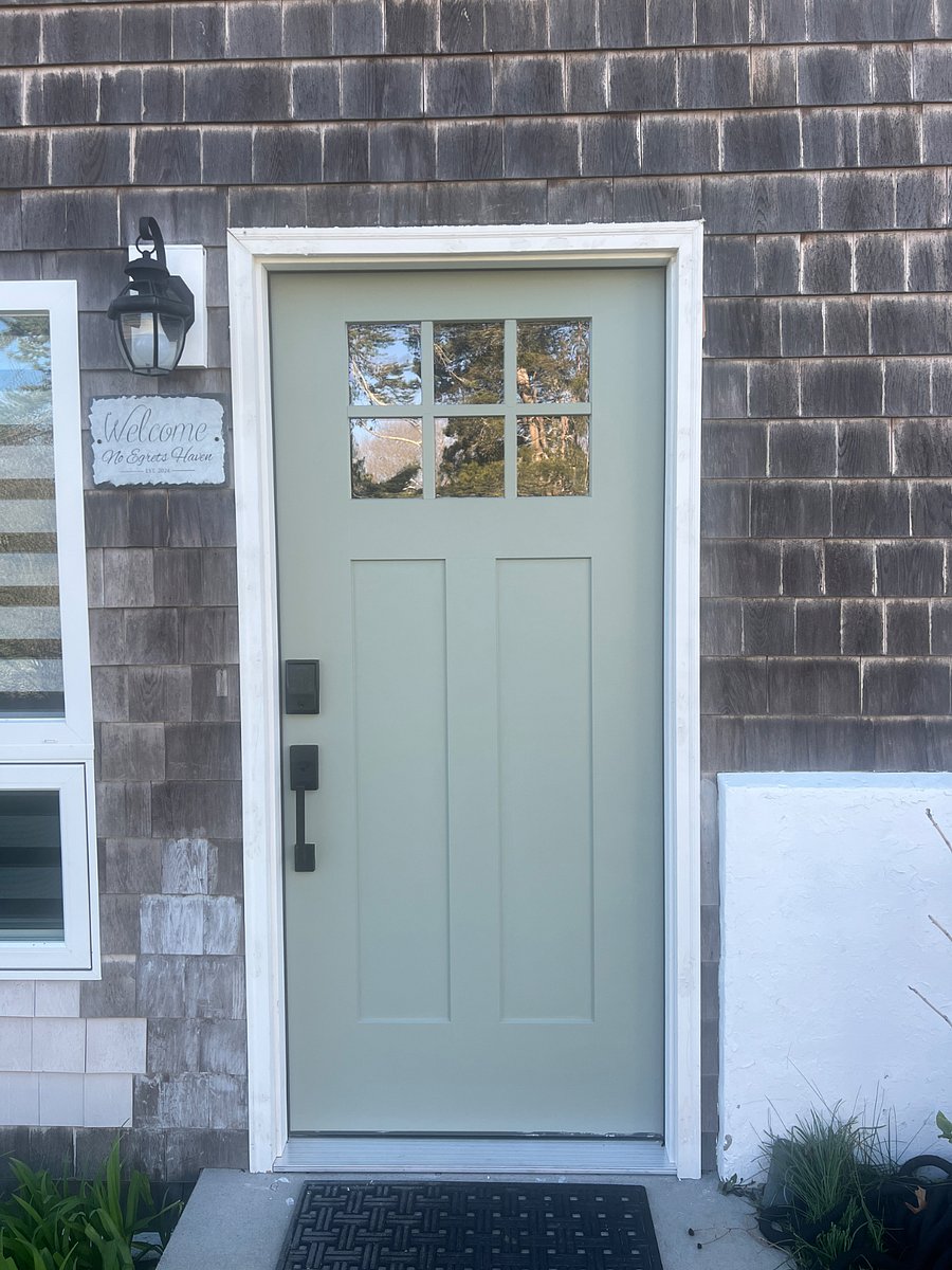 Door to enter with code side of house down brick walk way