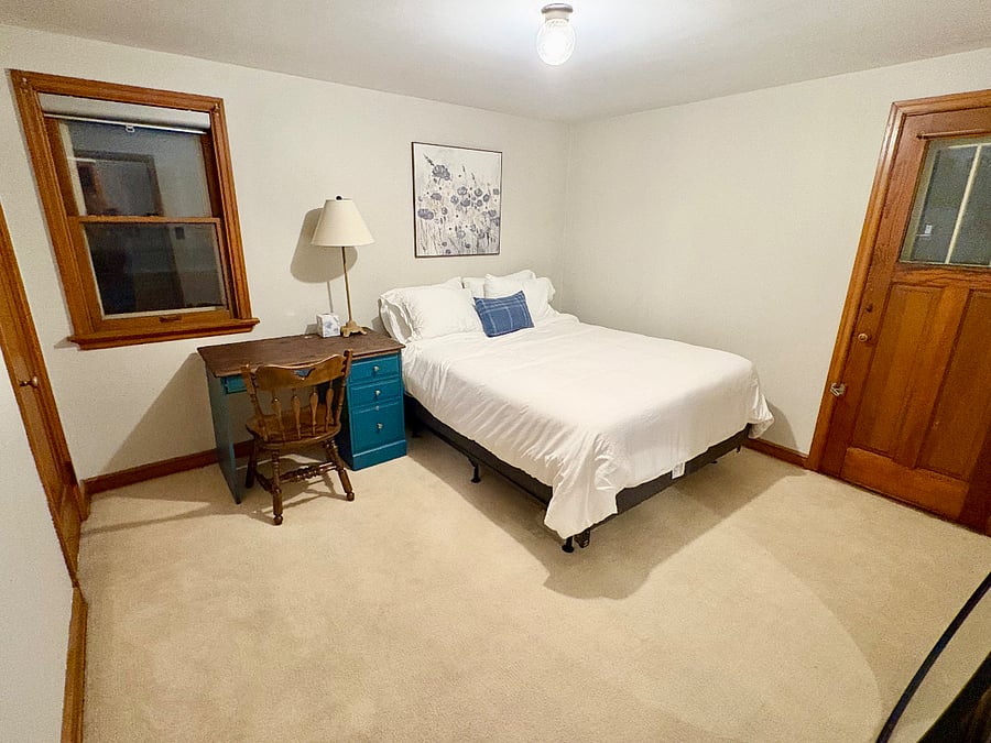 Bedroom 2 includes a desk for work from home. North and East views with blackout shades.