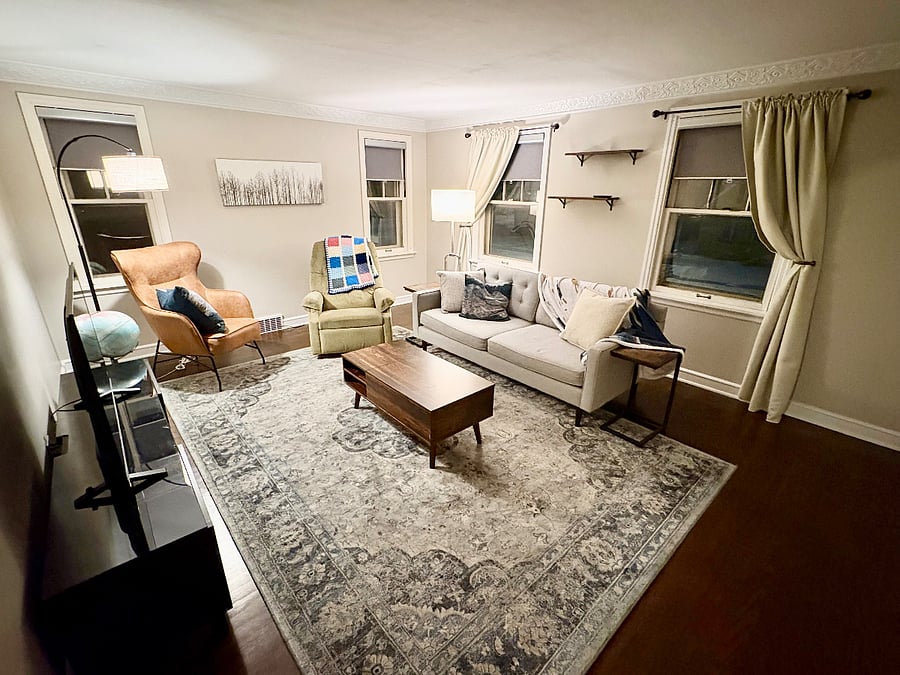 Cozy living room with a smart tv. South and west views.