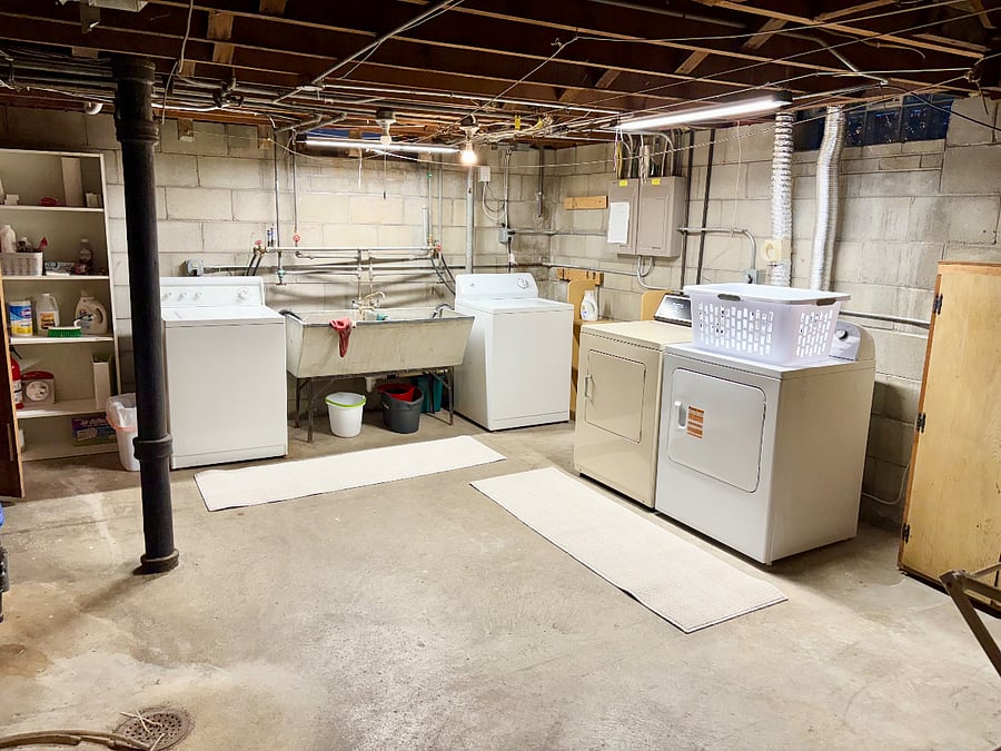 Free washer and dryer in basement with laundry shoot from unit. Storage units in basement as well.