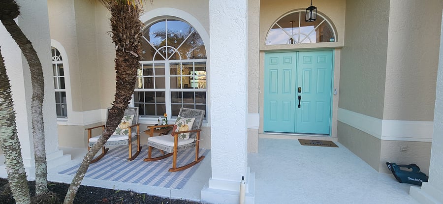 Inviting and Coastal Covered Front Porch Entryway. 