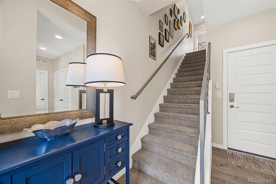 Main level entry area with door to 2-car attached garage